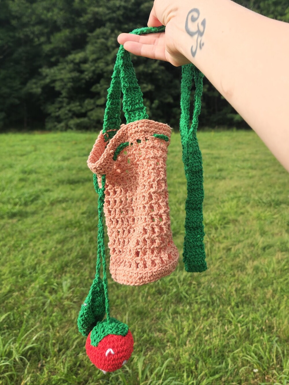 "Berry Cute" Handmade Crochet Bottle Bag with Green Strap and Strawberry Charm